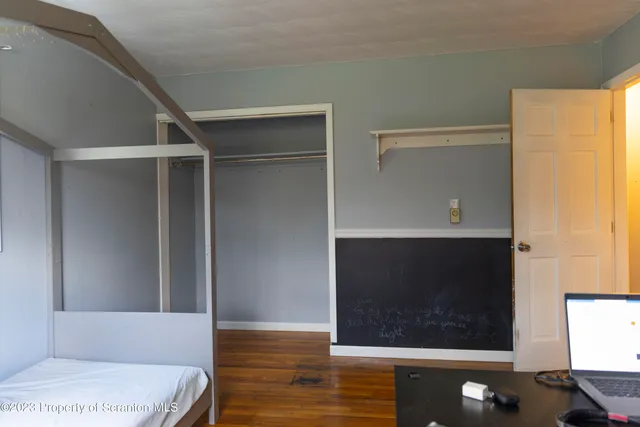 a bathroom with a bathtub and a window