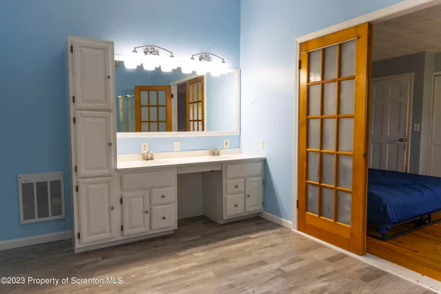 a view of front door with wooden floor