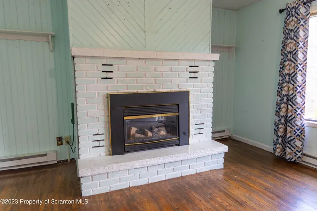 a living room with a fireplace