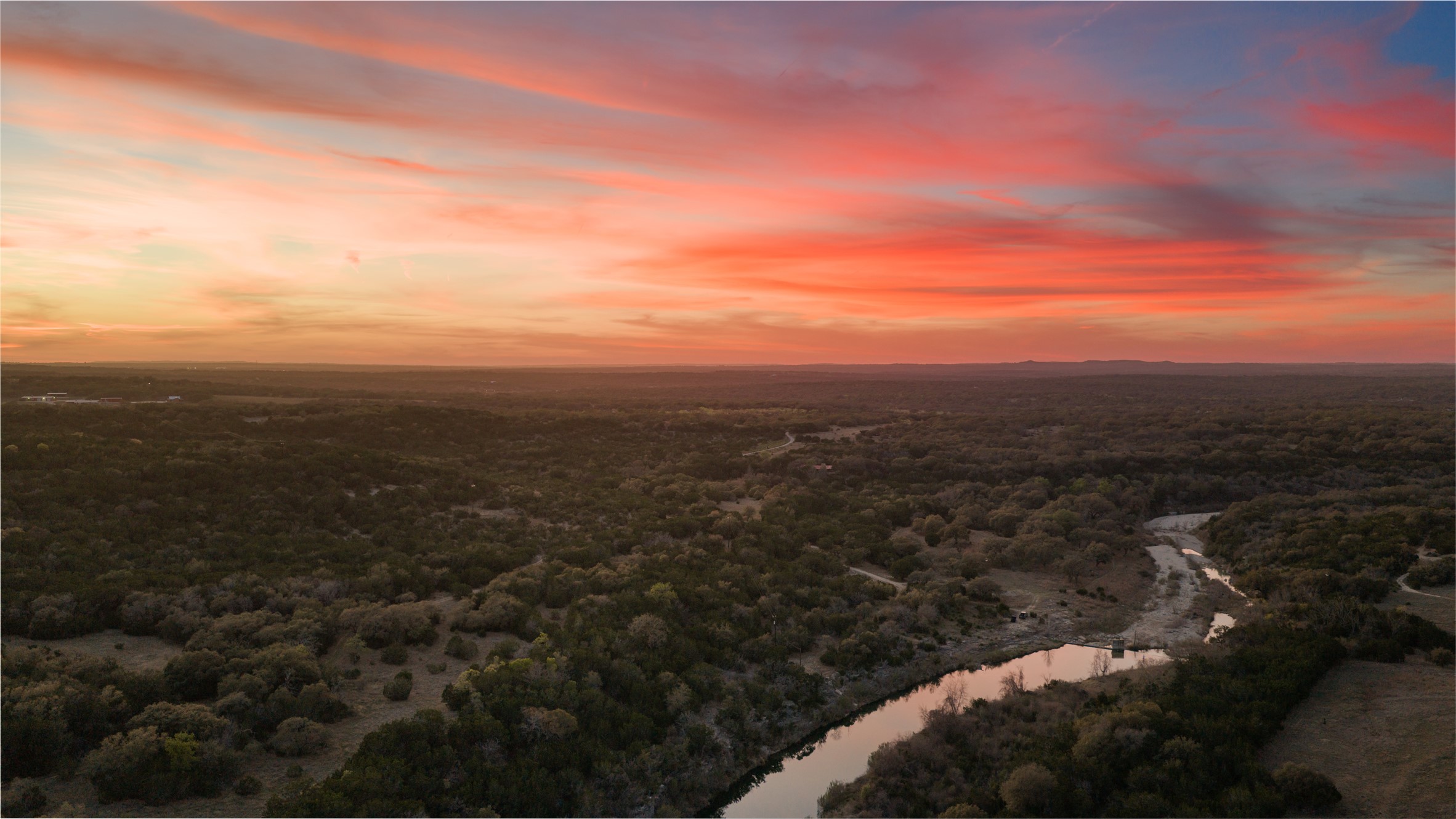 892 Baird Ranch Road Johnson City, TX 78636 - Photo 2 of 39 a view of a city and mountains