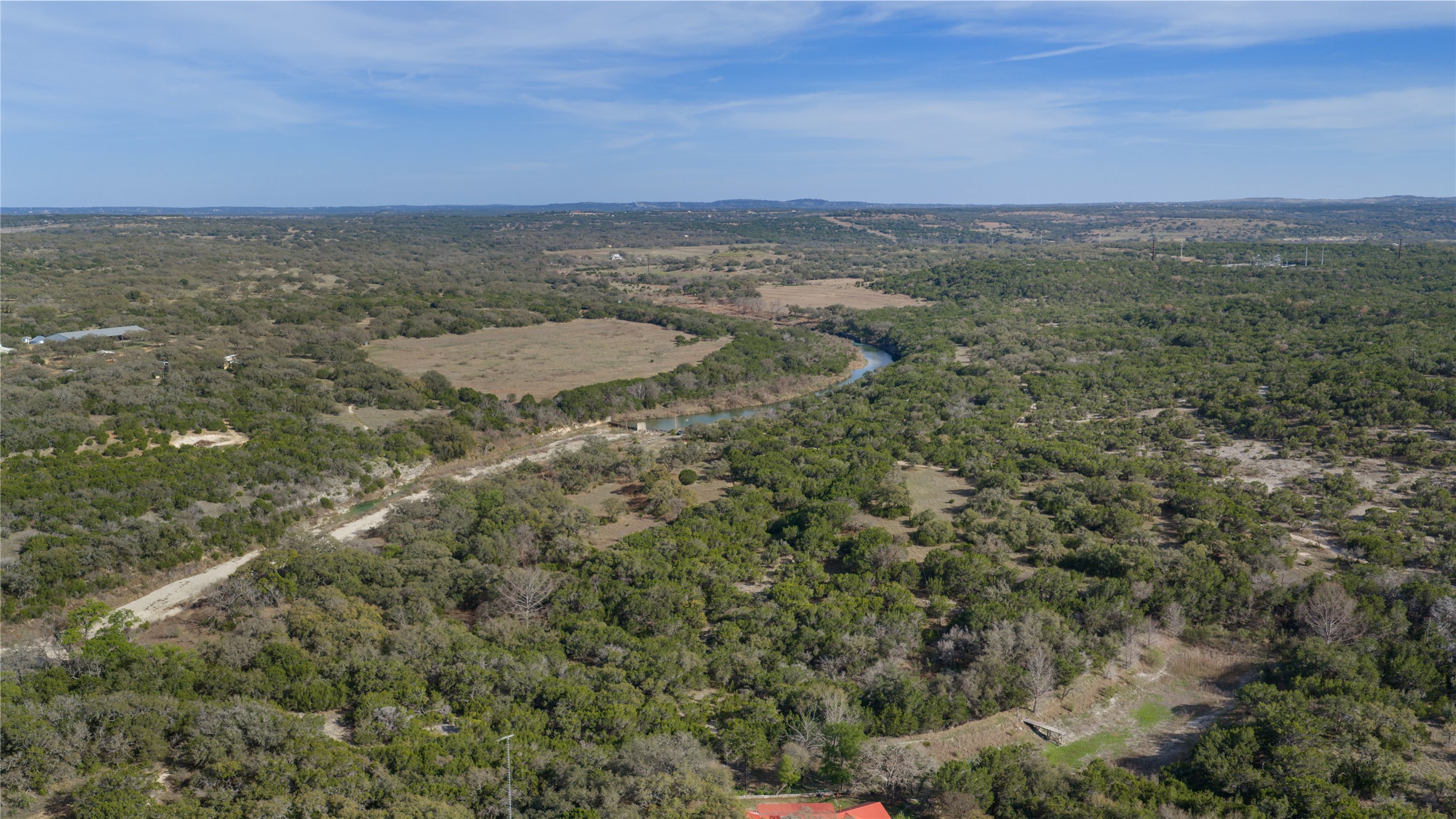 892 Baird Ranch Road Johnson City, TX 78636 - Photo 23 of 39 an aerial view of residential houses with outdoor space and trees