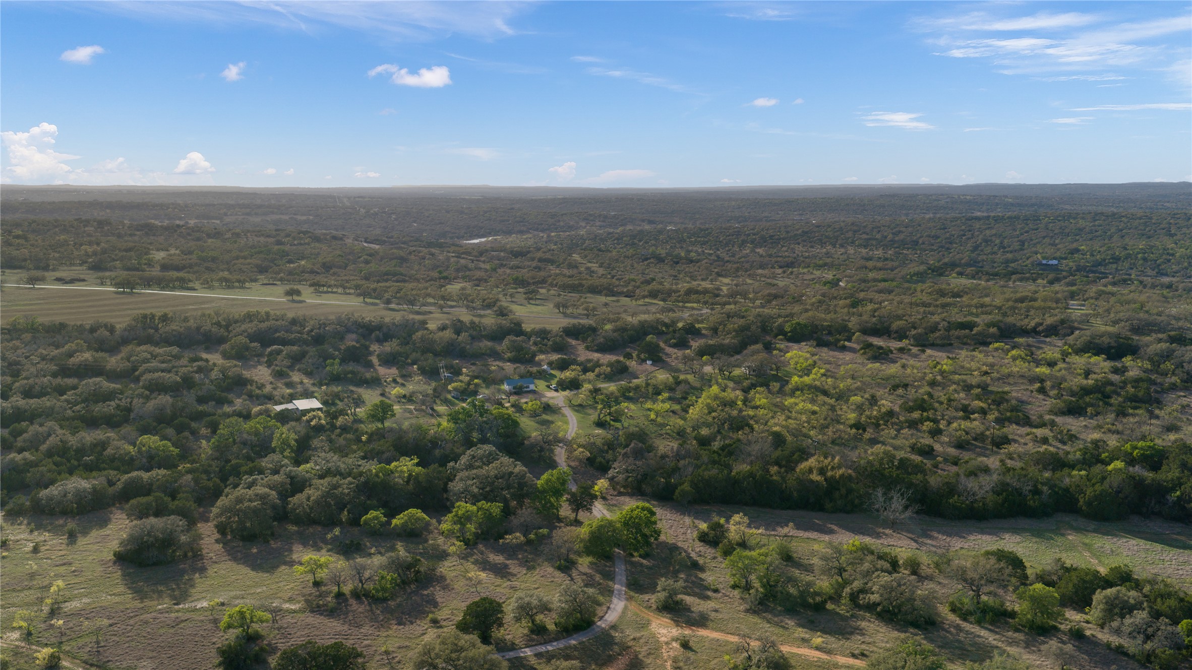 892 Baird Ranch Road Johnson City, TX 78636 - Photo 27 of 39 an aerial view of residential houses with outdoor space