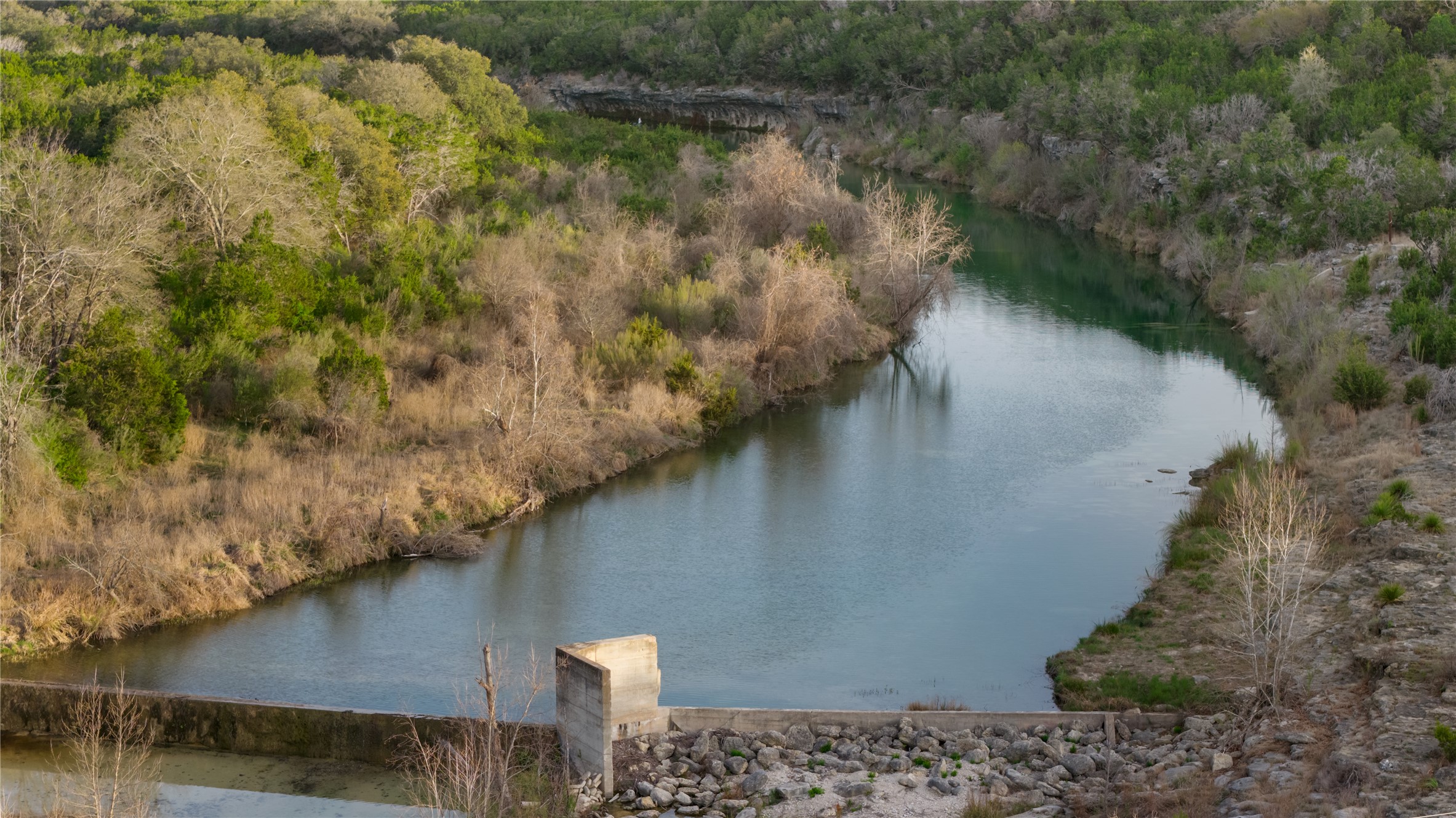 892 Baird Ranch Road Johnson City, TX 78636 - Photo 32 of 39 a view of a lake in the background