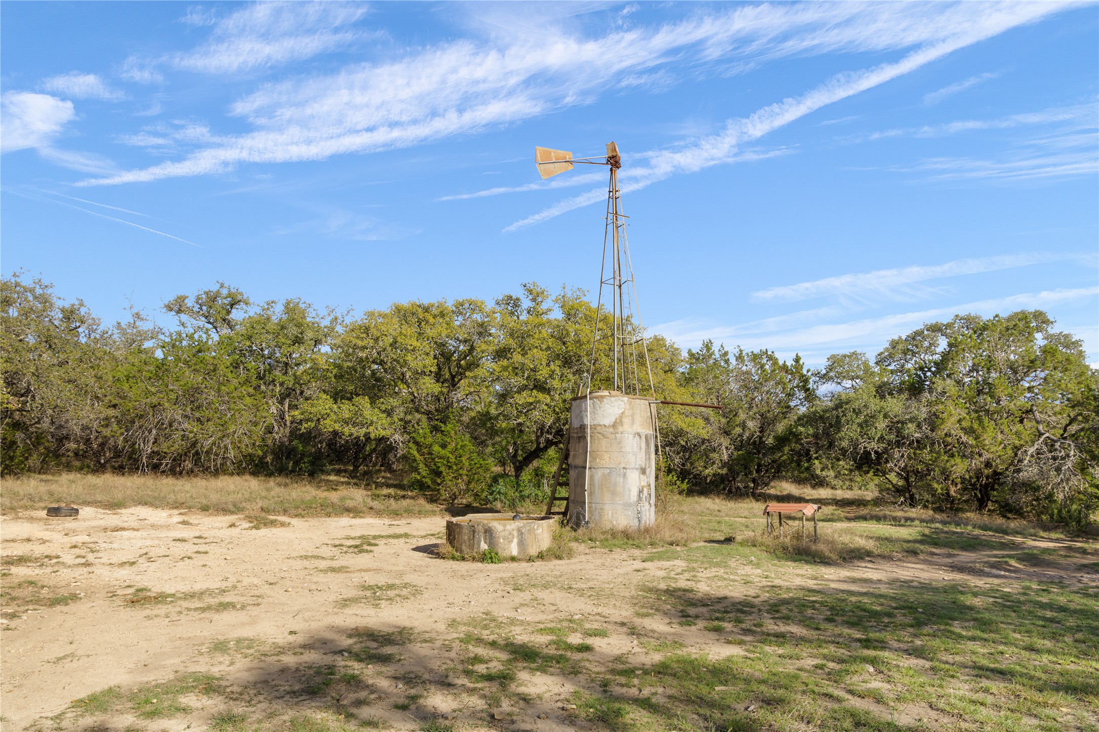 892 Baird Ranch Road Johnson City, TX 78636 - Photo 10 of 39 a view of a water with a fountain in the background