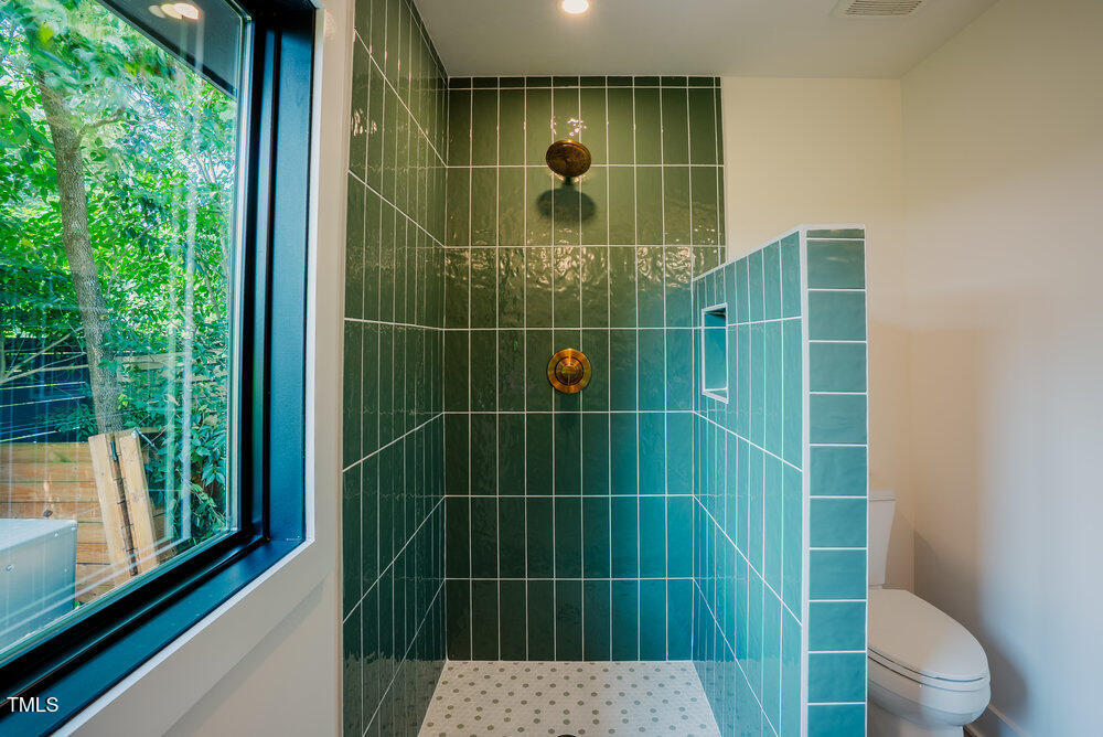 2129 Ridge Road Raleigh, NC 27607 - Photo 32 of 56 a bathroom with a shower