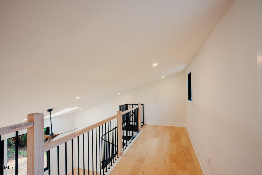 2129 Ridge Road Raleigh, NC 27607 - Photo 37 of 56 a view of a hallway with closet