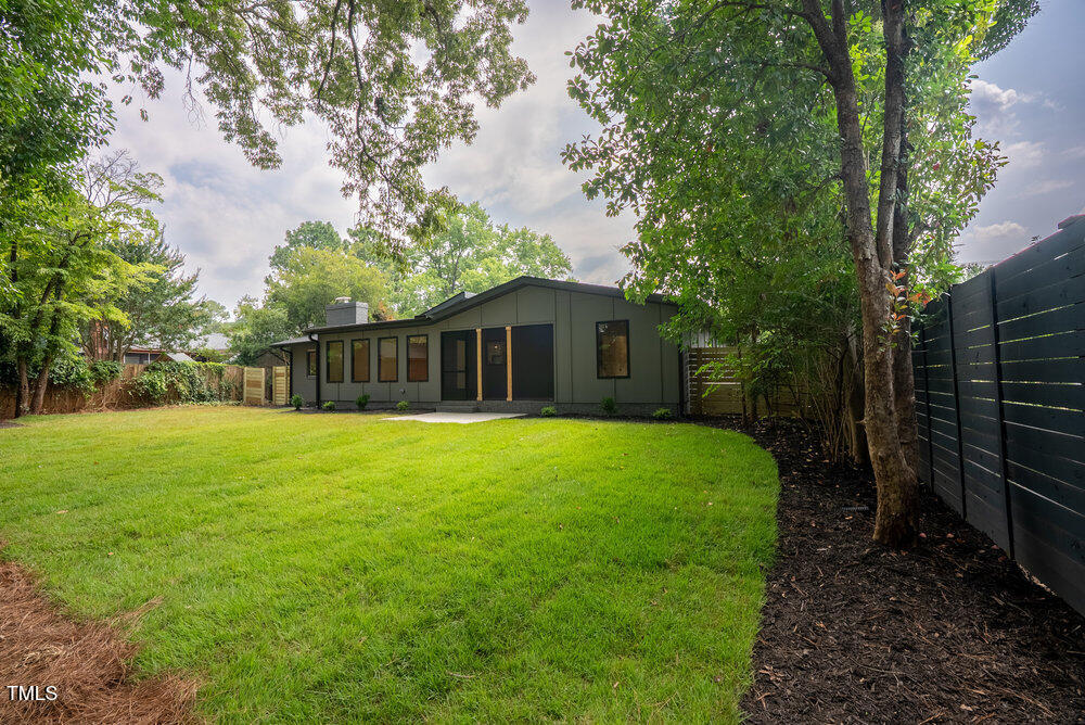 2129 Ridge Road Raleigh, NC 27607 - Photo 51 of 56 a view of a house with backyard and garden
