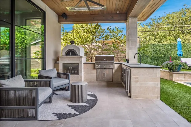 a view of a house with backyard from a porch