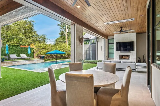 a patio with table and chairs