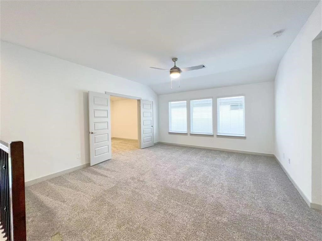 28310 Hazel Trail Katy, TX 77494 - Photo 16 of 26 a view of an empty room with a window
