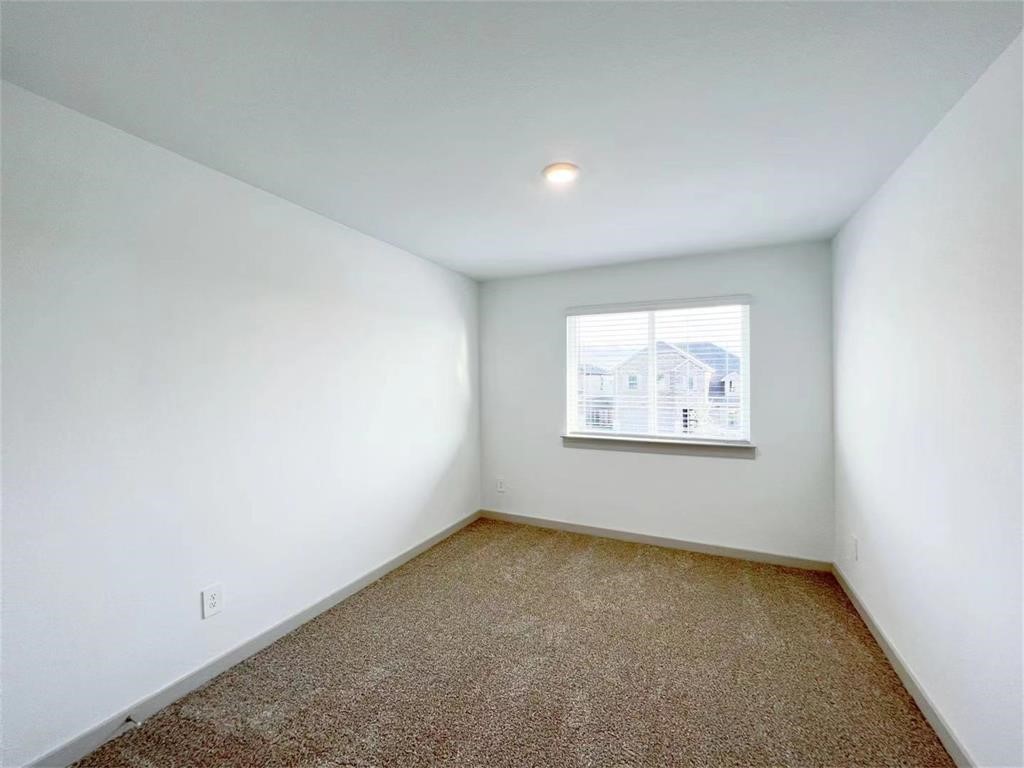 28310 Hazel Trail Katy, TX 77494 - Photo 17 of 26 an empty room with windows