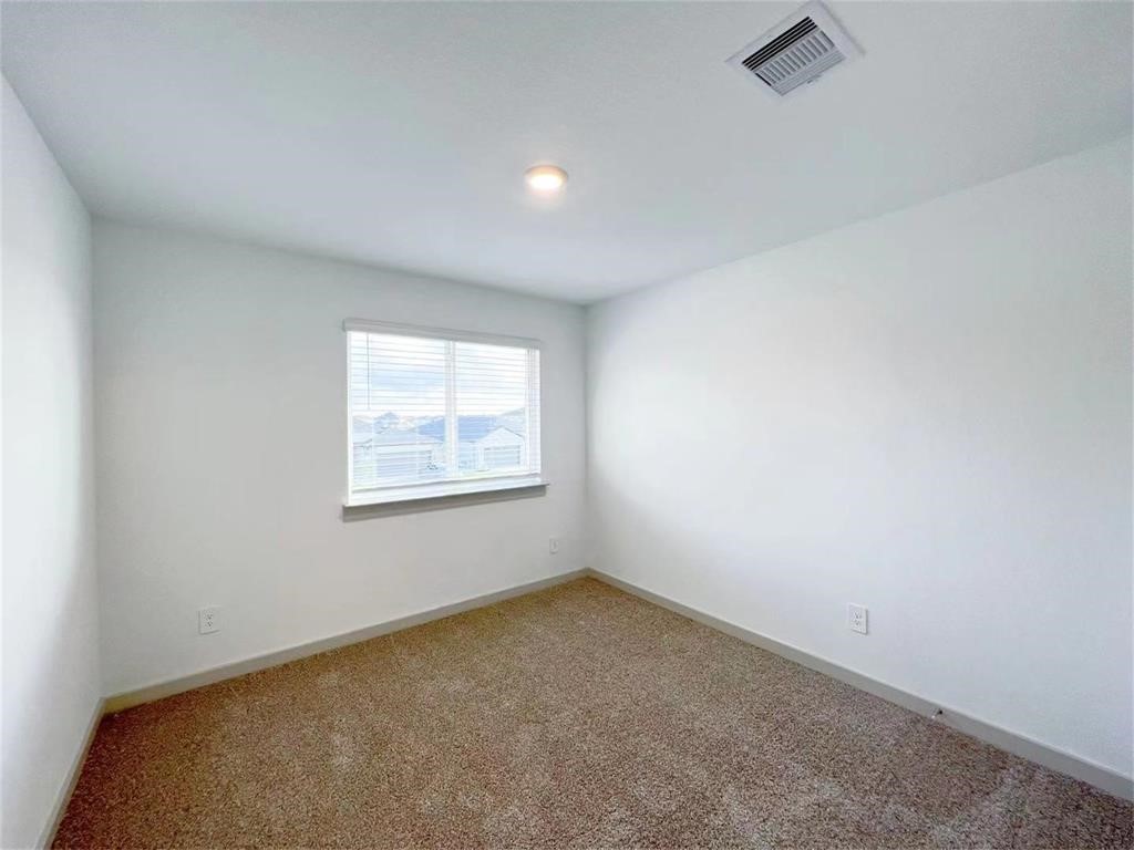 28310 Hazel Trail Katy, TX 77494 - Photo 18 of 26 an empty room with a window