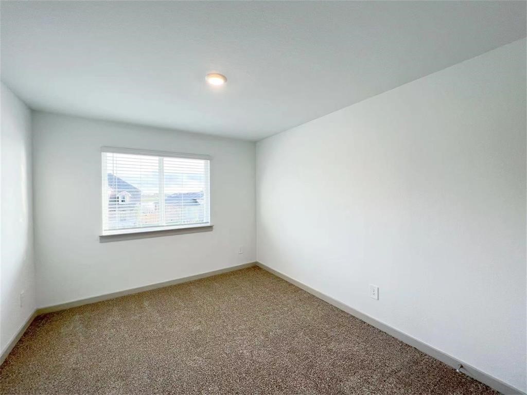 28310 Hazel Trail Katy, TX 77494 - Photo 19 of 26 an empty room with windows