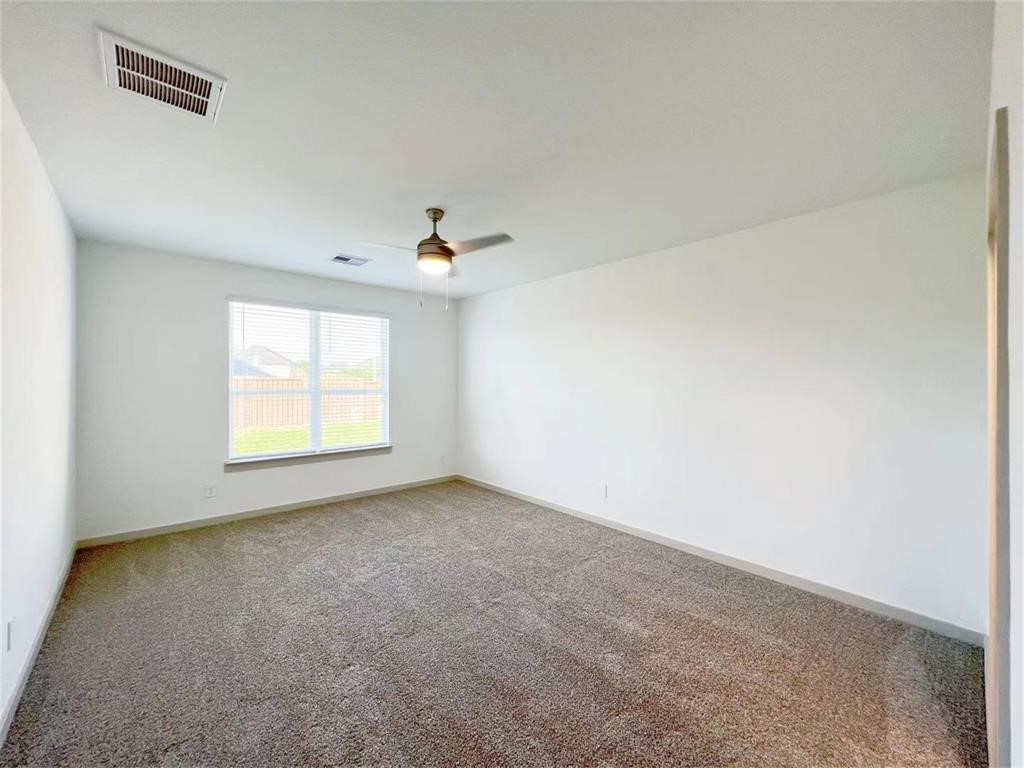 28310 Hazel Trail Katy, TX 77494 - Photo 20 of 26 an empty room with a window
