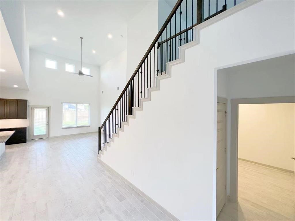 28310 Hazel Trail Katy, TX 77494 - Photo 6 of 26 a view of entryway and hall with wooden floor