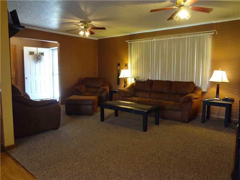 384 Gillespie Road Dawson, PA 15428 - Photo 4 of 25 Living Room. Spacious Room with New Carpeting, Paint and beautiful Front Bay Window.