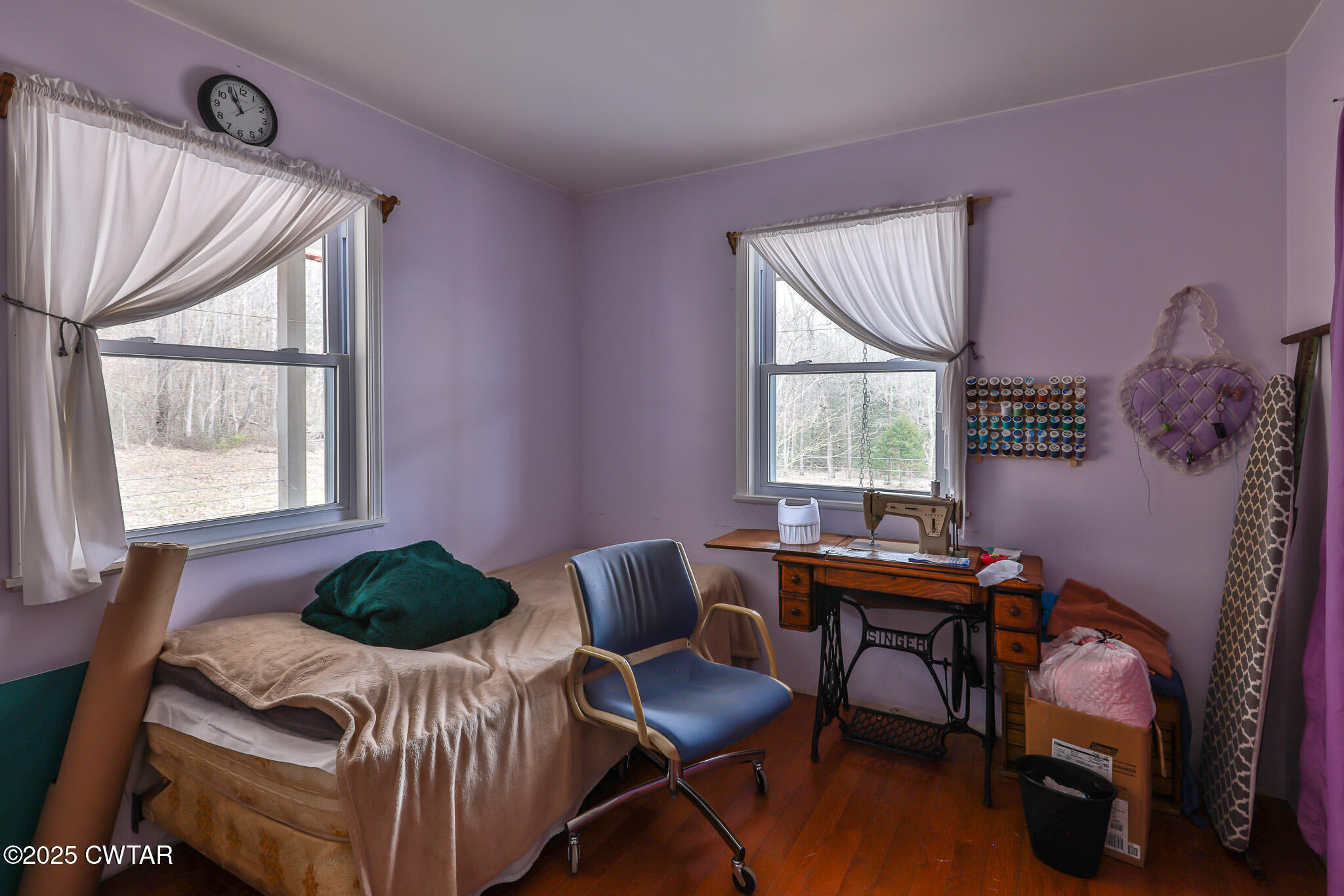 1421 Copper Spring Road Springville, TN 38256 - Photo 27 of 79 a workspace with furniture and a window