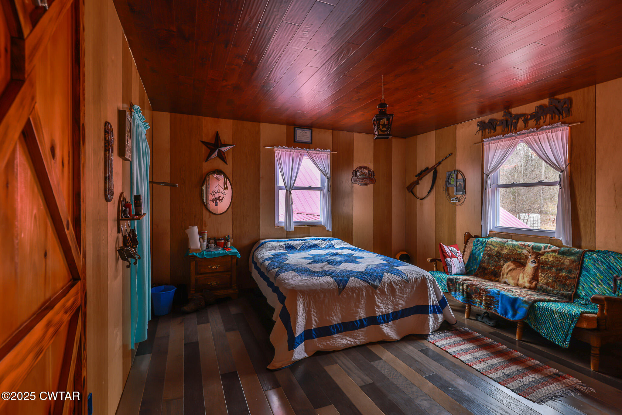 1421 Copper Spring Road Springville, TN 38256 - Photo 33 of 79 a bedroom with bed and a window