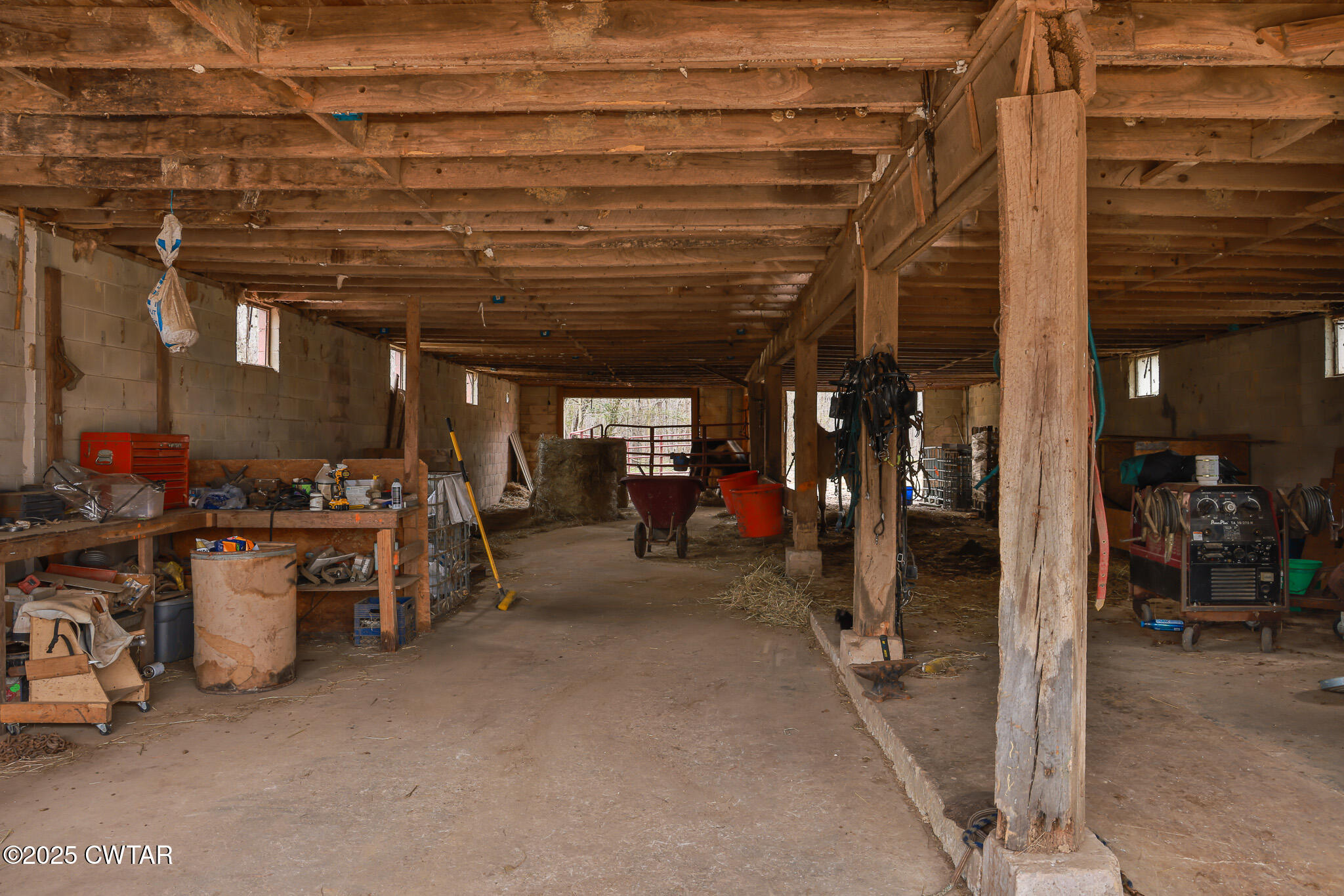 1421 Copper Spring Road Springville, TN 38256 - Photo 63 of 79 a view of a storage room with racks