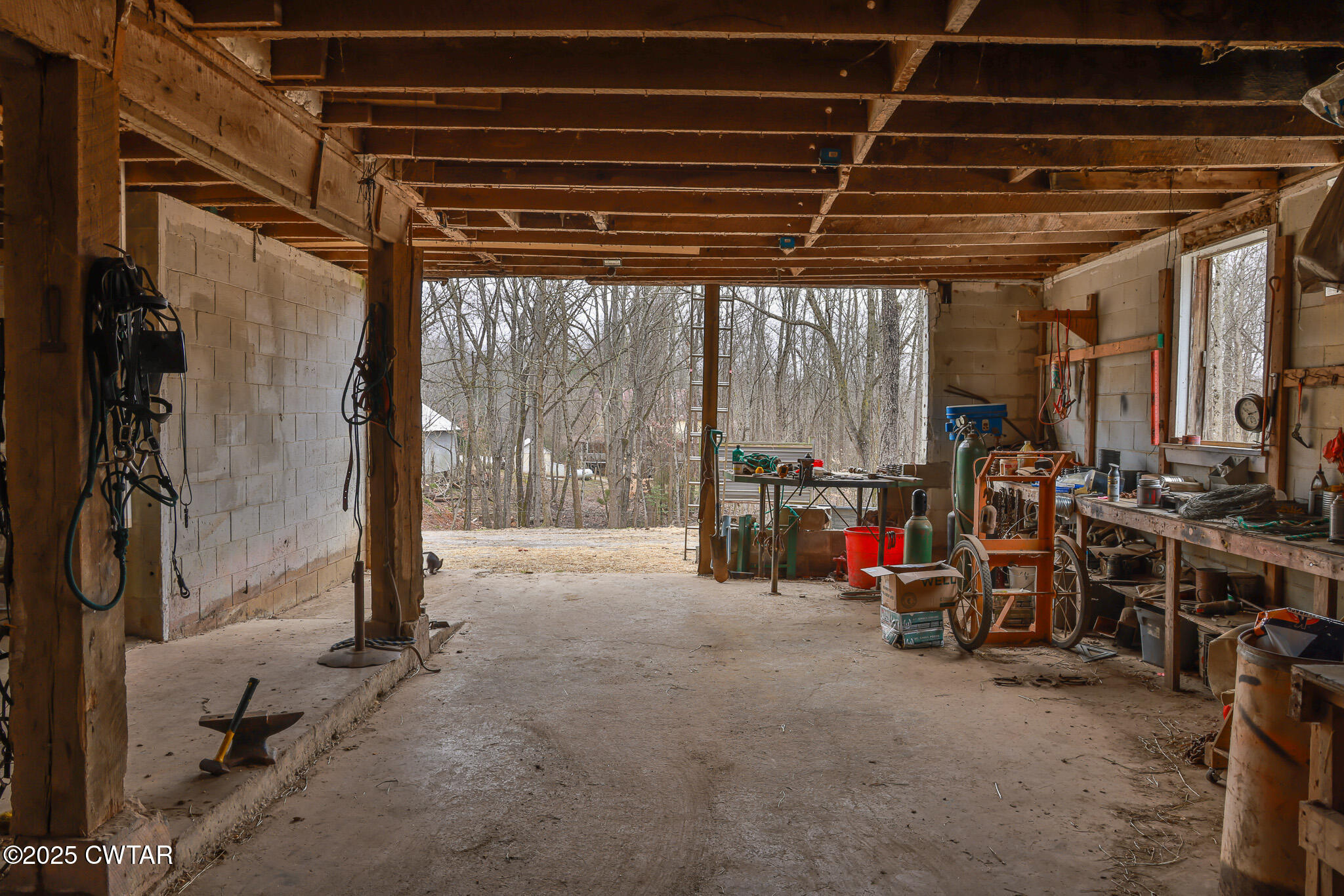 1421 Copper Spring Road Springville, TN 38256 - Photo 65 of 79 a view of a room with gym equipment
