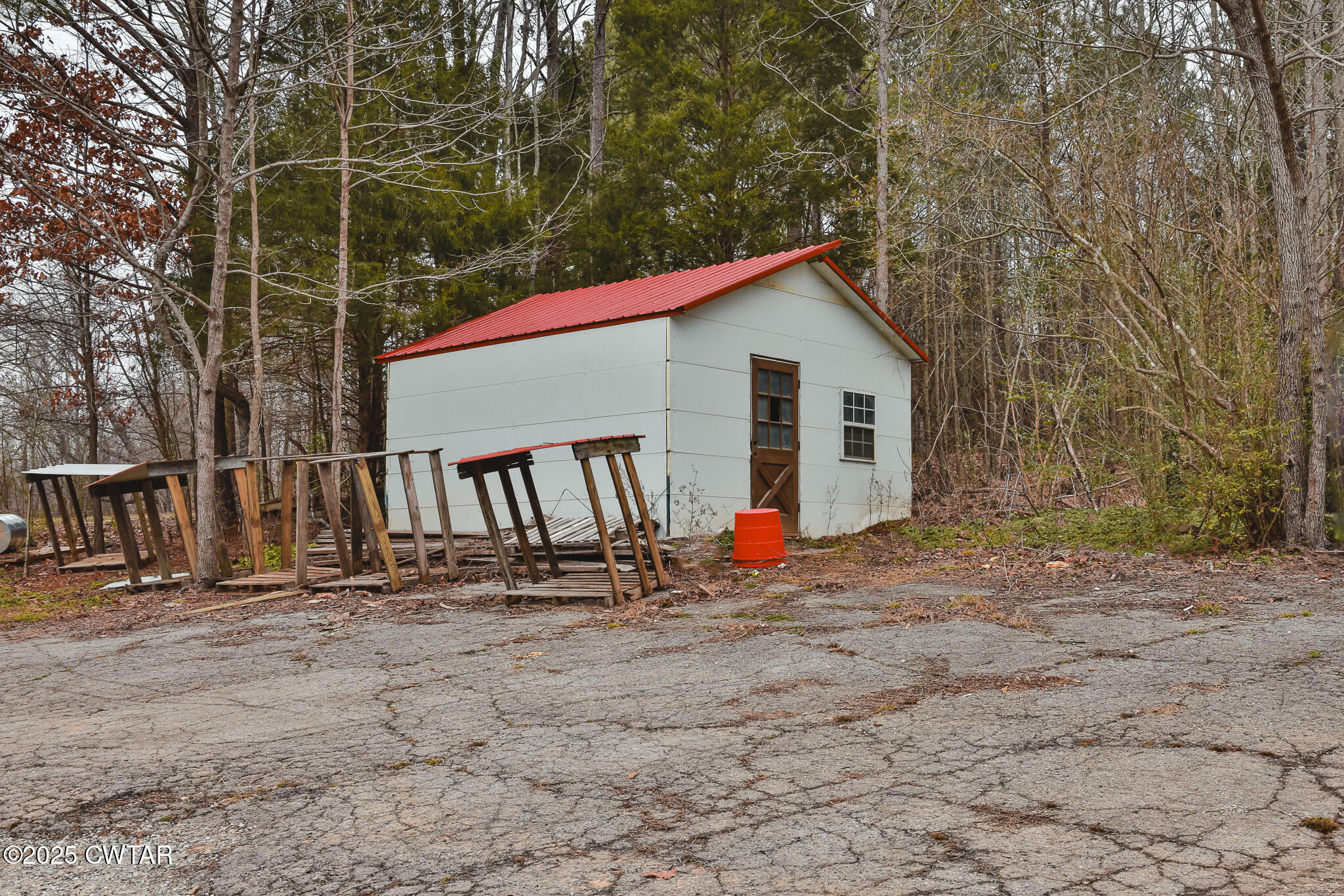 1421 Copper Spring Road Springville, TN 38256 - Photo 66 of 79 a view of a house with backyard and sitting area