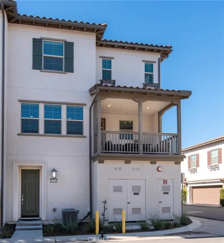 a front view of a house with balcony