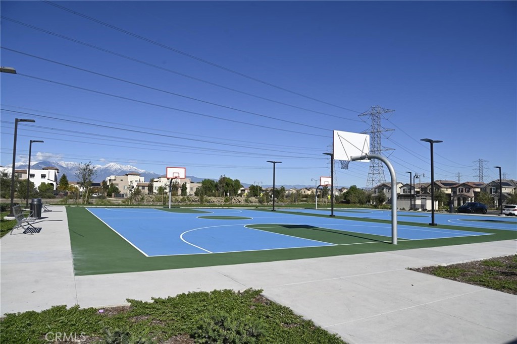 8474 Explorer Street Chino, CA 91708 - Photo 25 of 36 a view of an outdoor space and tennis court