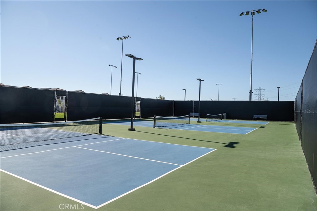 8474 Explorer Street Chino, CA 91708 - Photo 28 of 36 a view of an outdoor space and tennis court