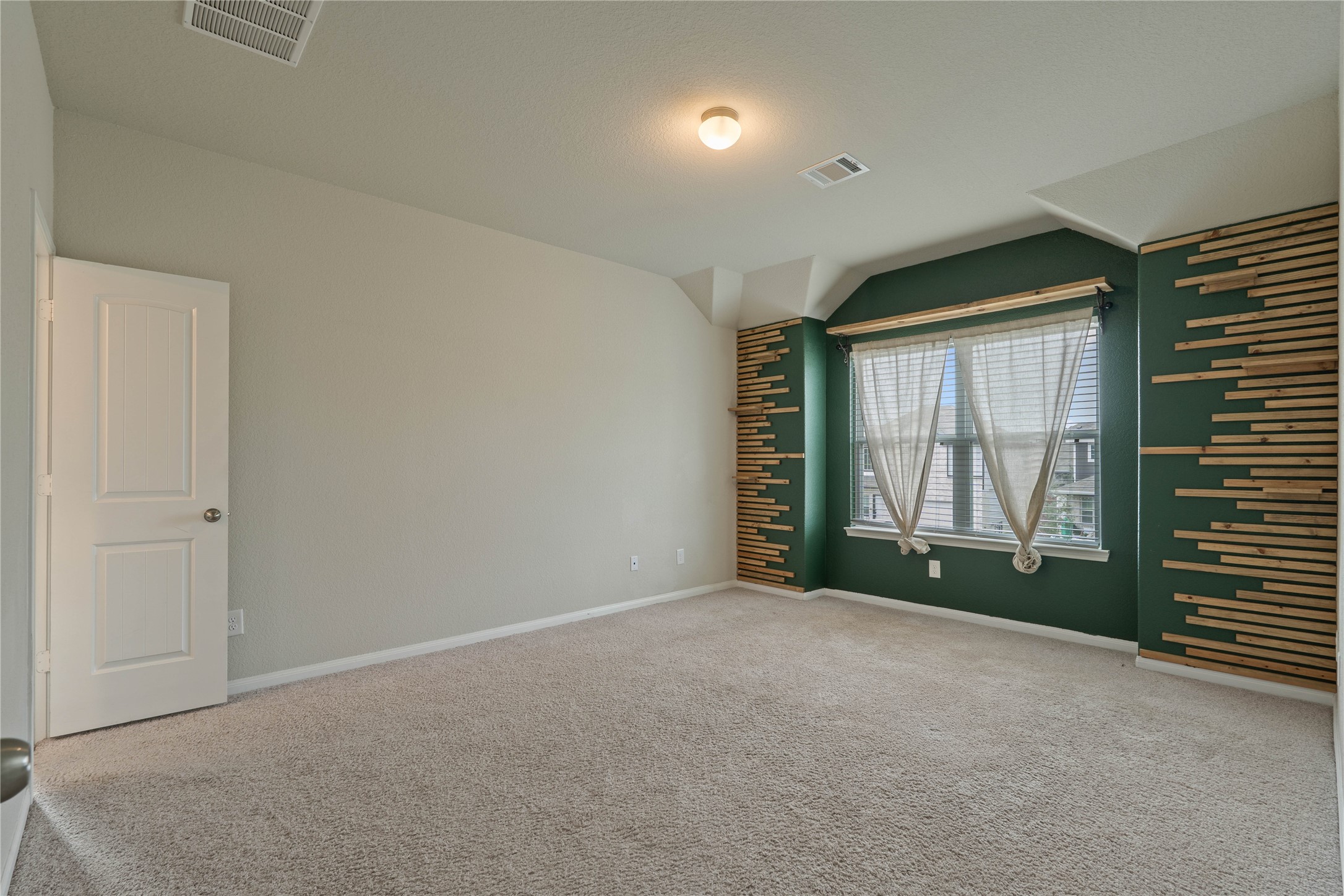 2205 Angie Kaye Drive Conroe, TX 77301 - Photo 23 of 46 an empty room with windows