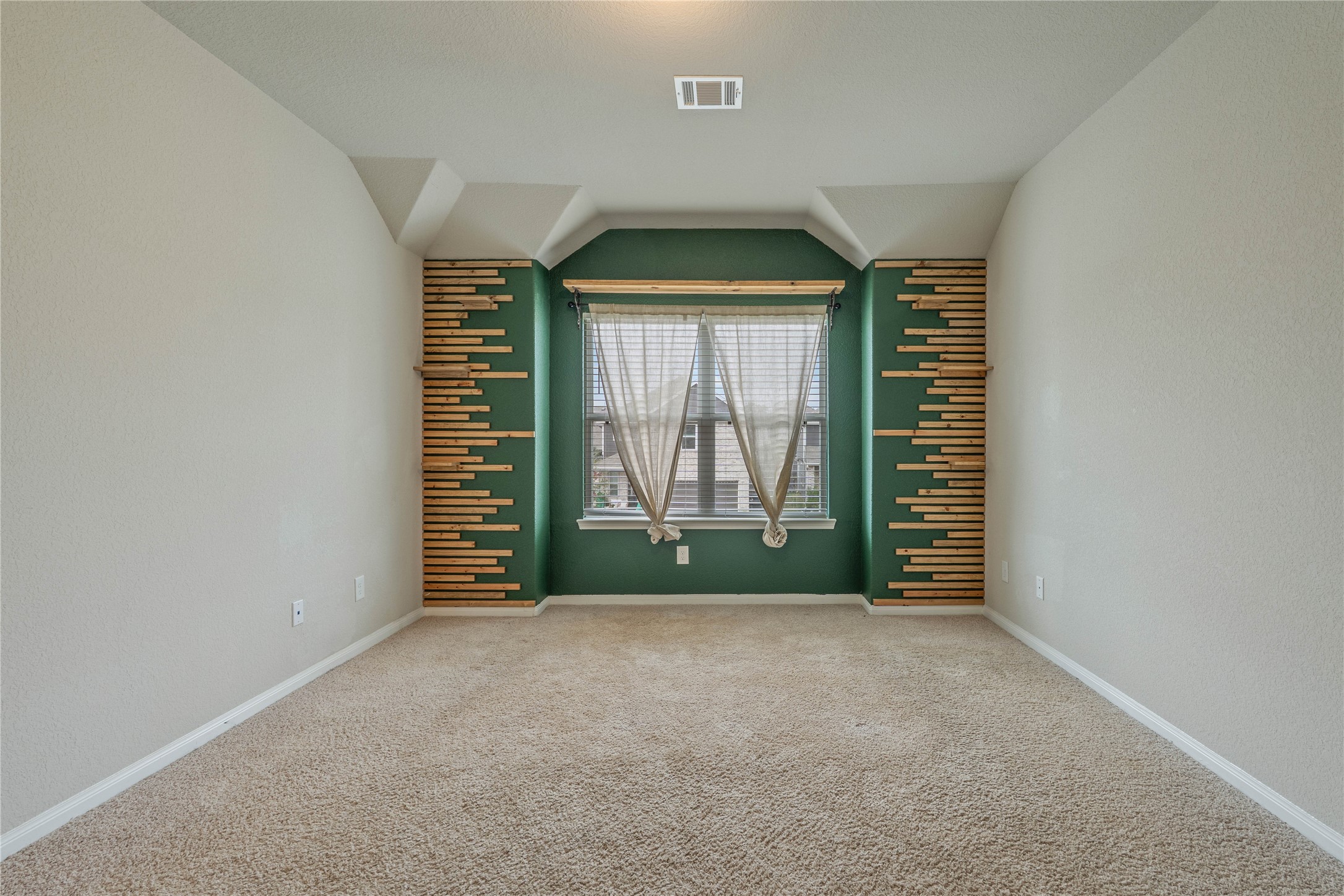 2205 Angie Kaye Drive Conroe, TX 77301 - Photo 24 of 46 a view of an empty room with a window