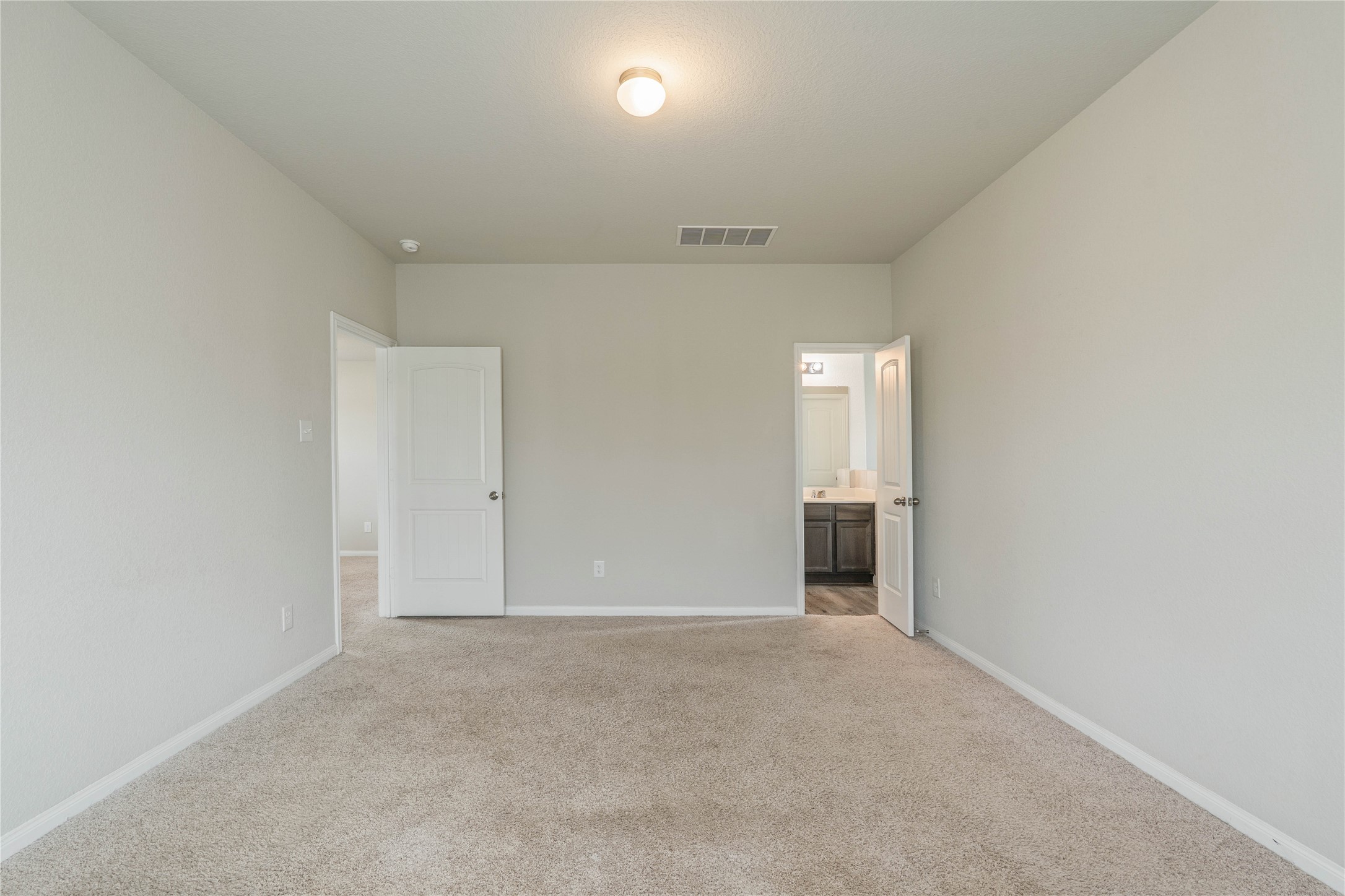 2205 Angie Kaye Drive Conroe, TX 77301 - Photo 25 of 46 an empty room with a bathroom