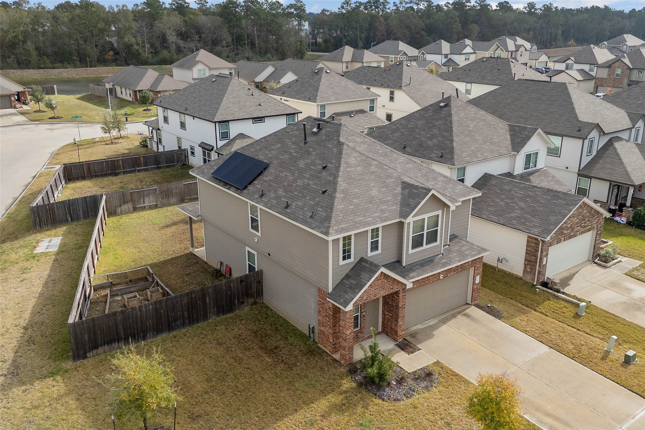 2205 Angie Kaye Drive Conroe, TX 77301 - Photo 42 of 46 an aerial view of a house with a yard