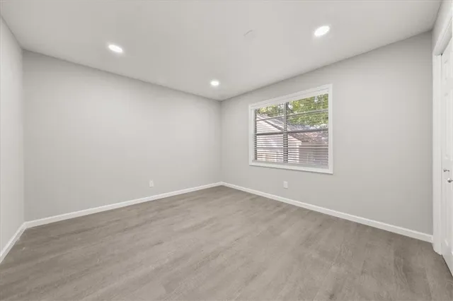 an empty room with windows