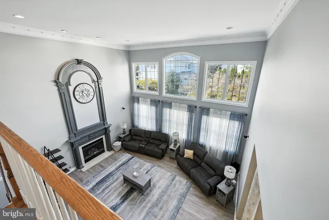 a white toilet sitting next to a bathroom sink