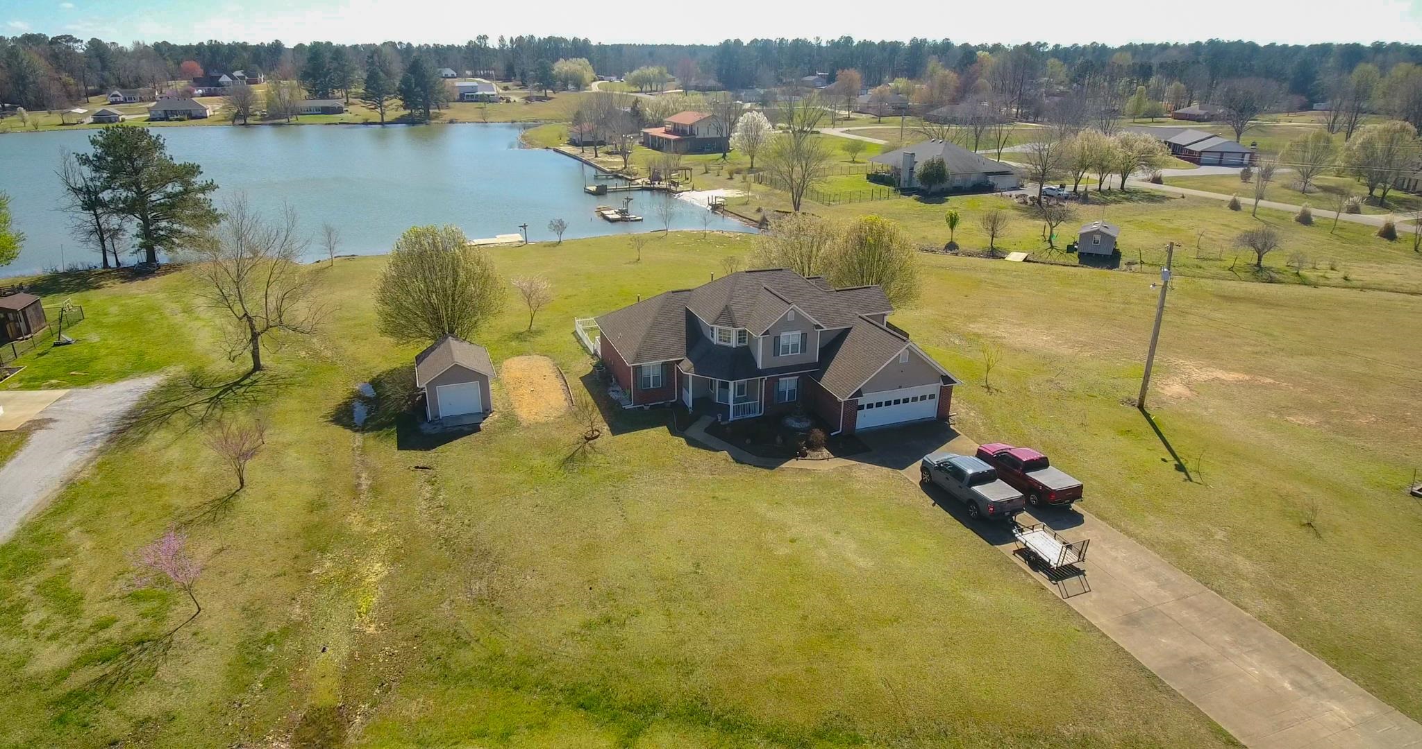 a view of a lake with a swimming pool