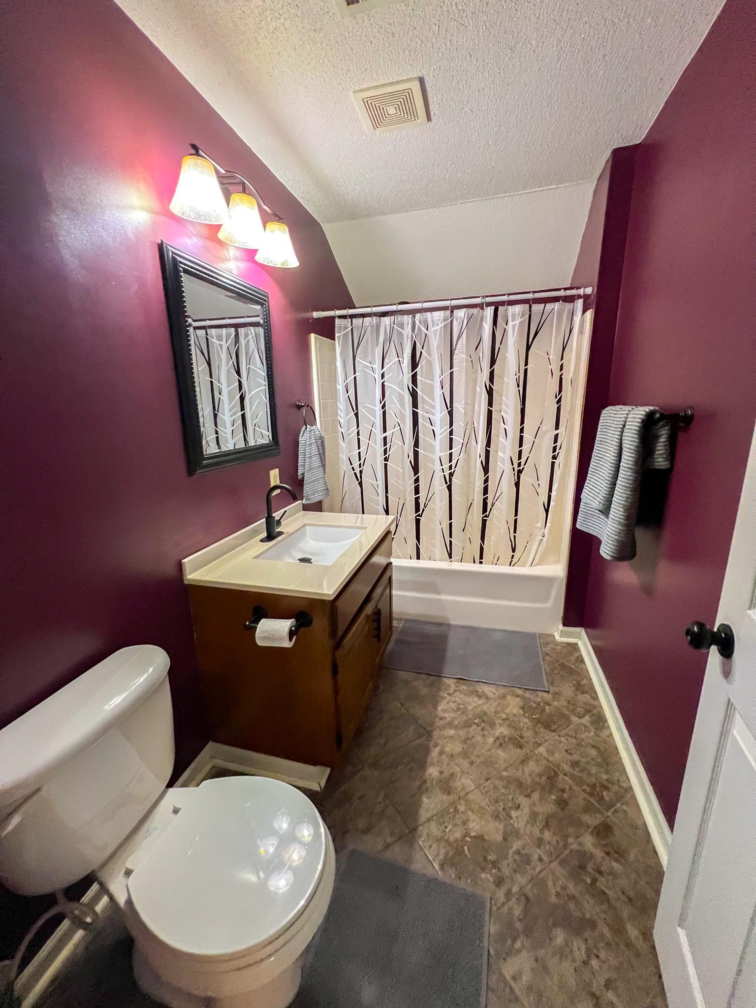 96 County Road 178 Iuka, MS 38852 - Photo 14 of 21 a bathroom with a toilet sink and mirror