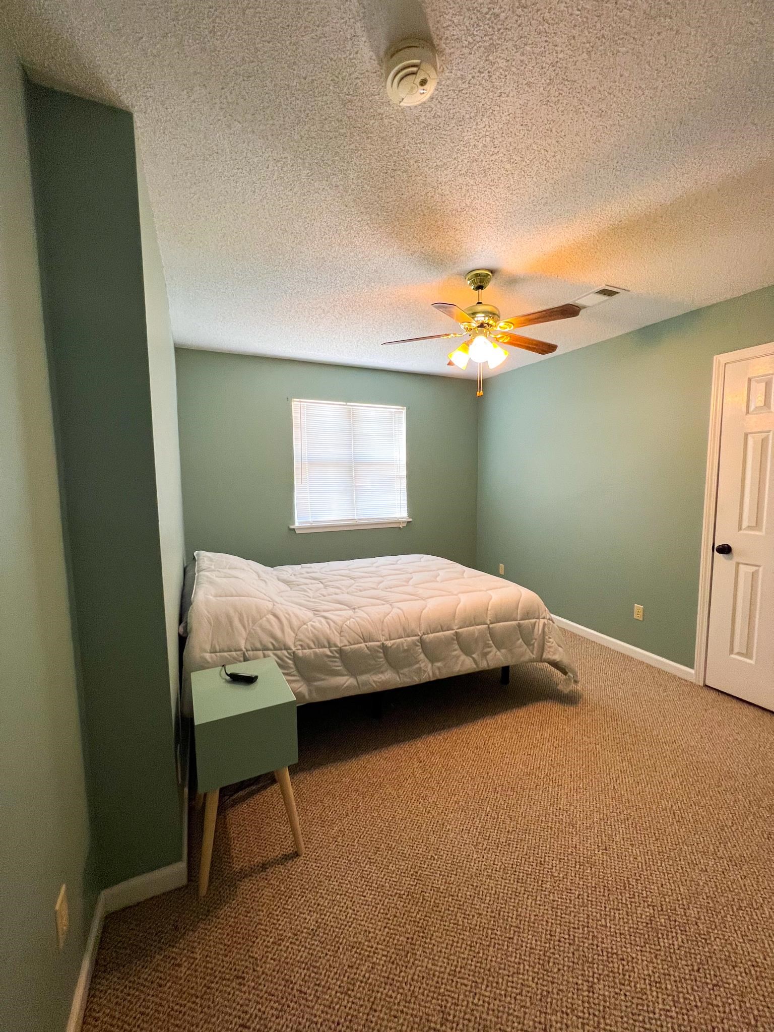 96 County Road 178 Iuka, MS 38852 - Photo 15 of 21 a bedroom with a bed and a window