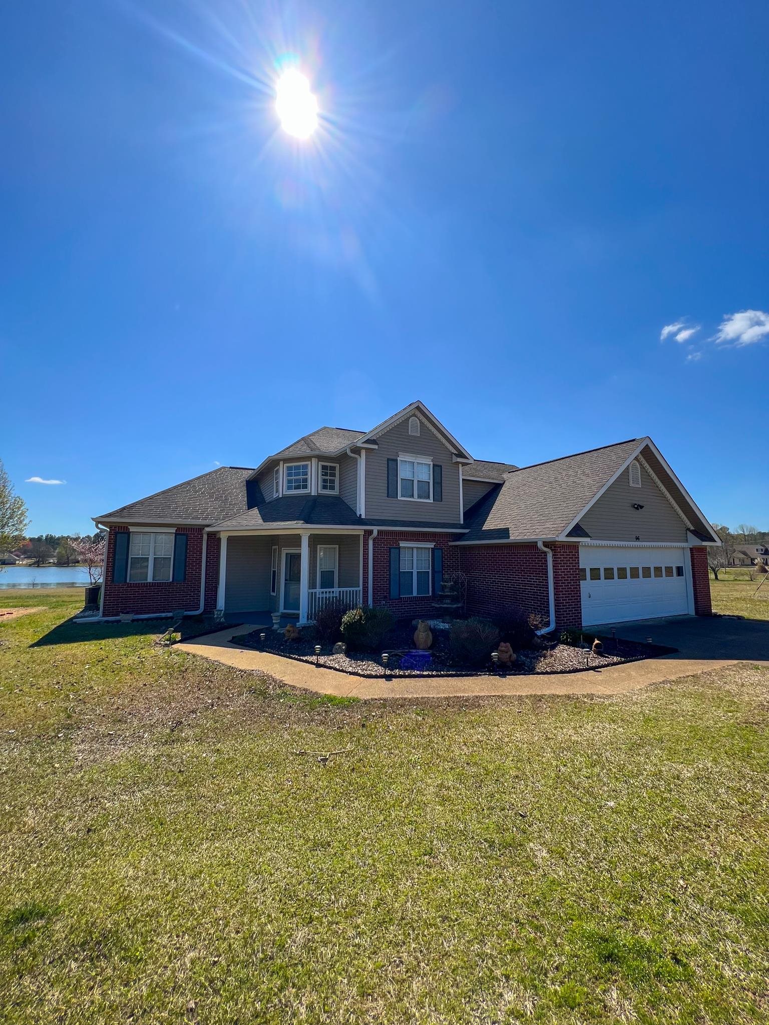 96 County Road 178 Iuka, MS 38852 - Photo 2 of 21 a front view of a house with yard and balcony