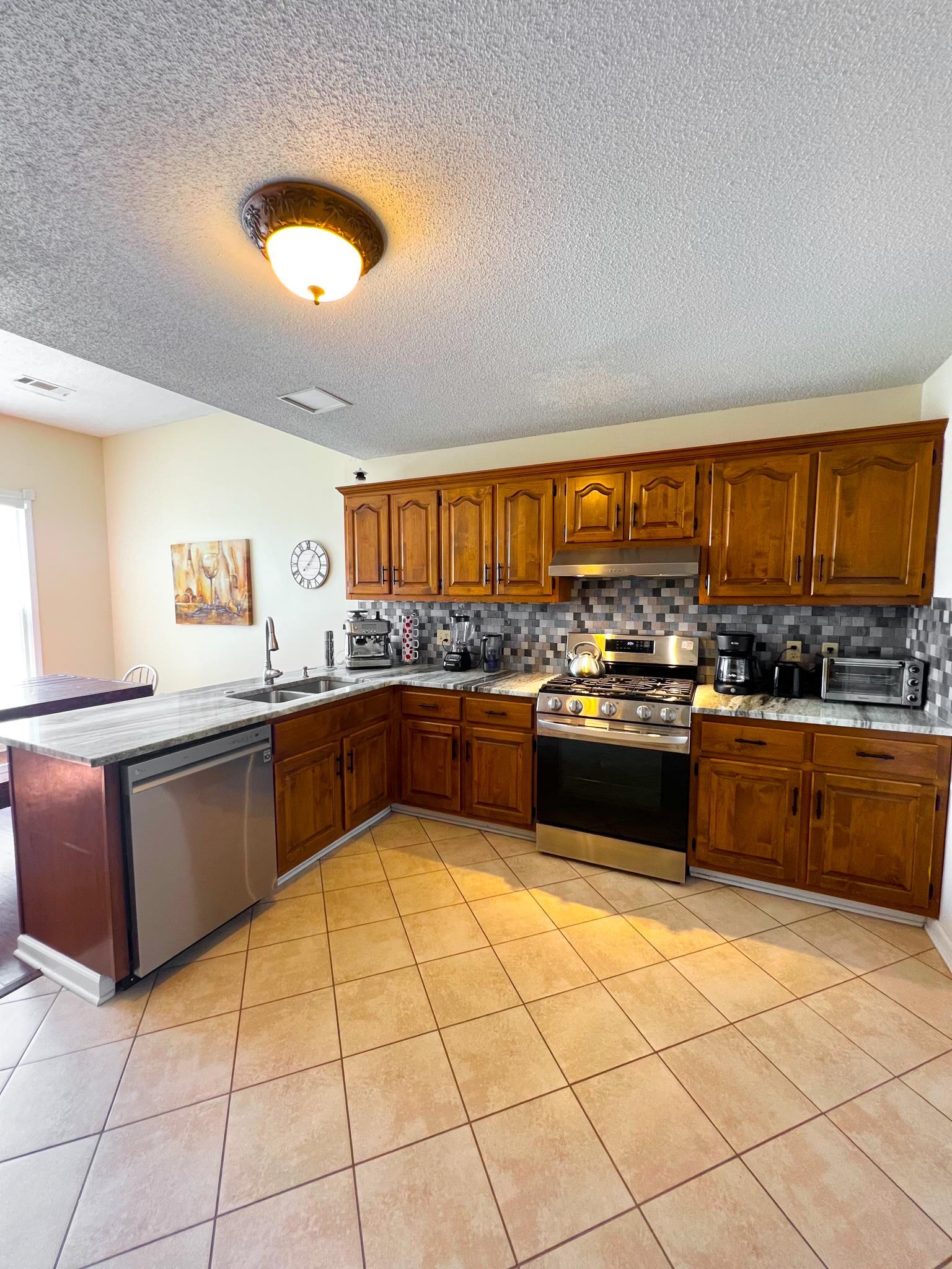 96 County Road 178 Iuka, MS 38852 - Photo 5 of 21 a kitchen with stainless steel appliances kitchen island granite countertop a stove sink and cabinets