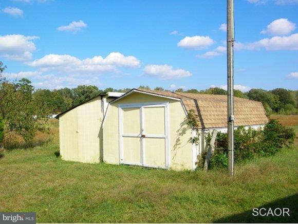 3922 Fox Hunters Road, Unit 1 Harrington, DE 19952 - Photo 14 of 16 a view of a garden