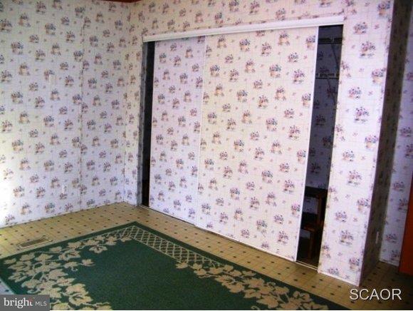 3922 Fox Hunters Road, Unit 1 Harrington, DE 19952 - Photo 7 of 16 a view of a wooden door