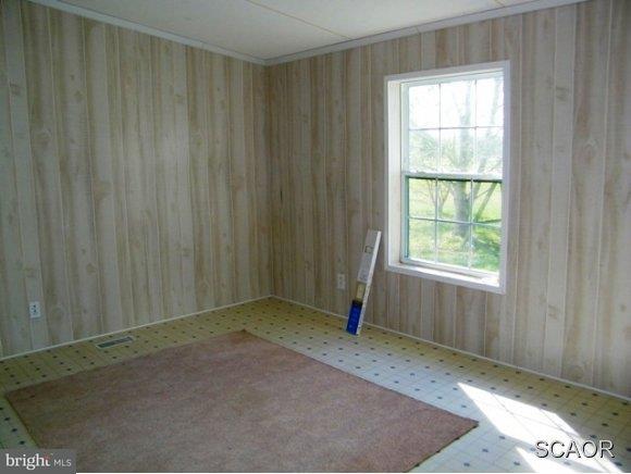 3922 Fox Hunters Road, Unit 1 Harrington, DE 19952 - Photo 9 of 16 a view of a room with a window