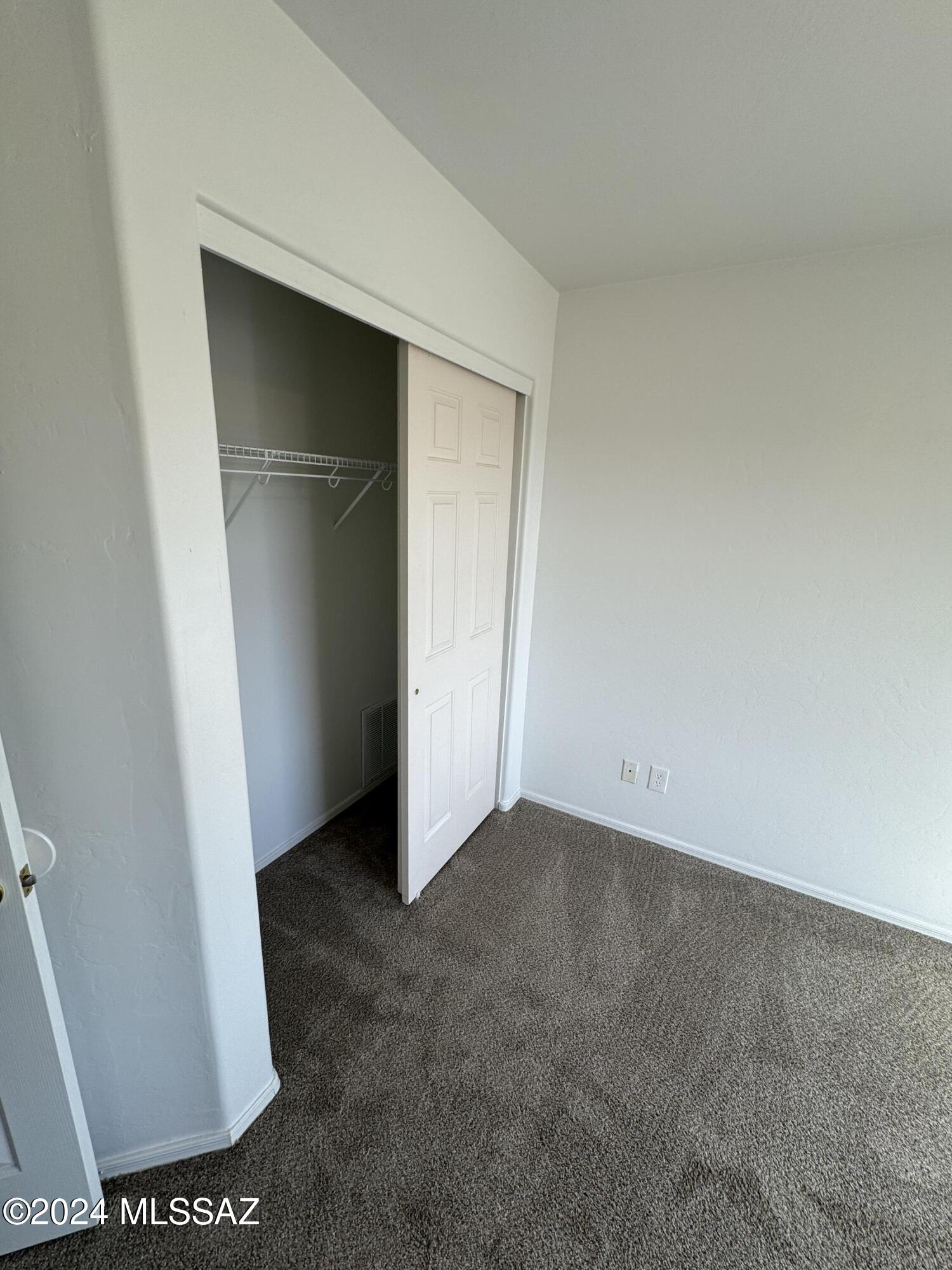1841 America Court Rio Rico, AZ 85648 - Photo 11 of 38 an empty room with closet