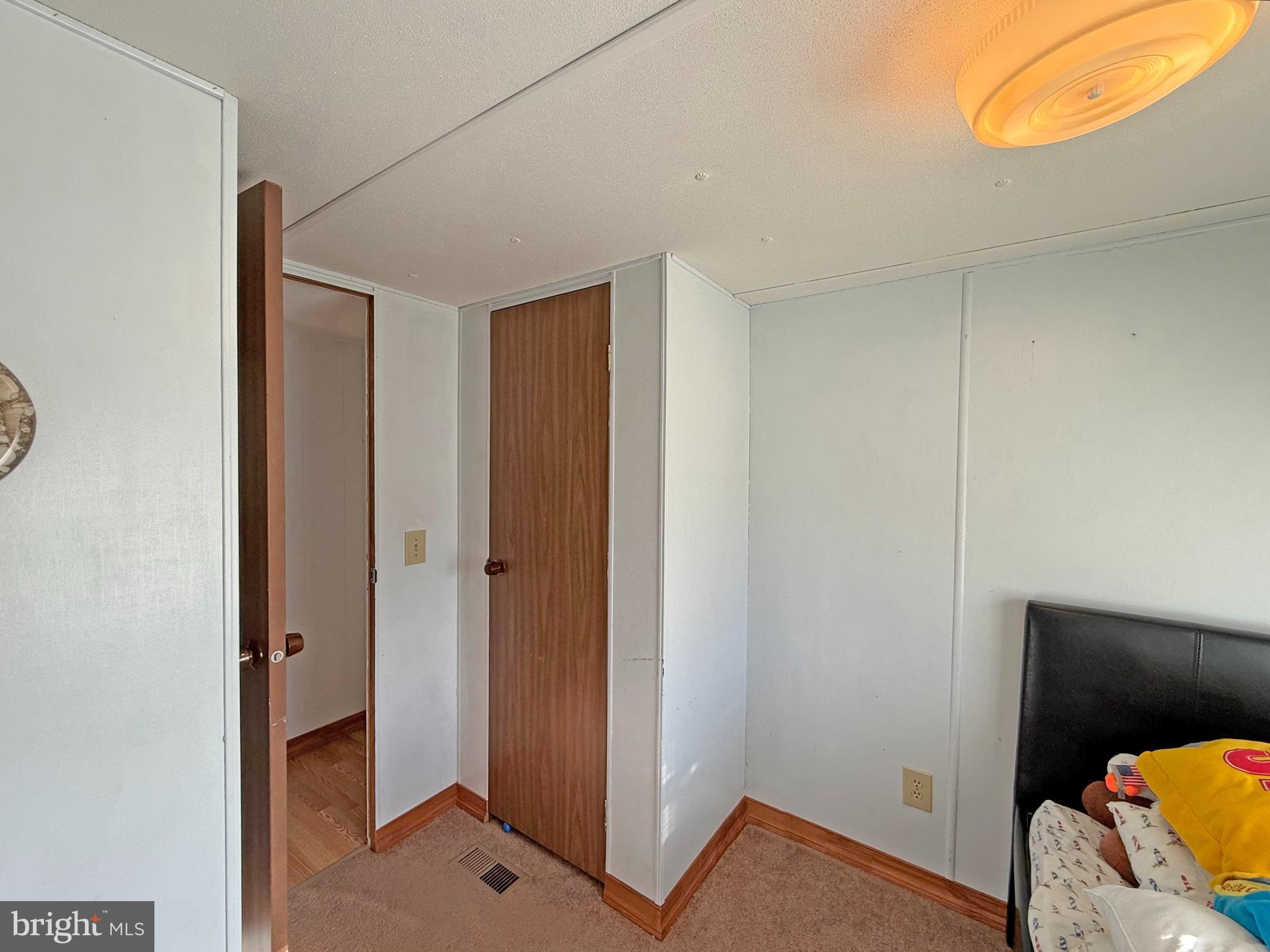 29 Baybreeze Road, Unit C27 Rehoboth Beach, DE 19971 - Photo 13 of 26 Middle Bedroom