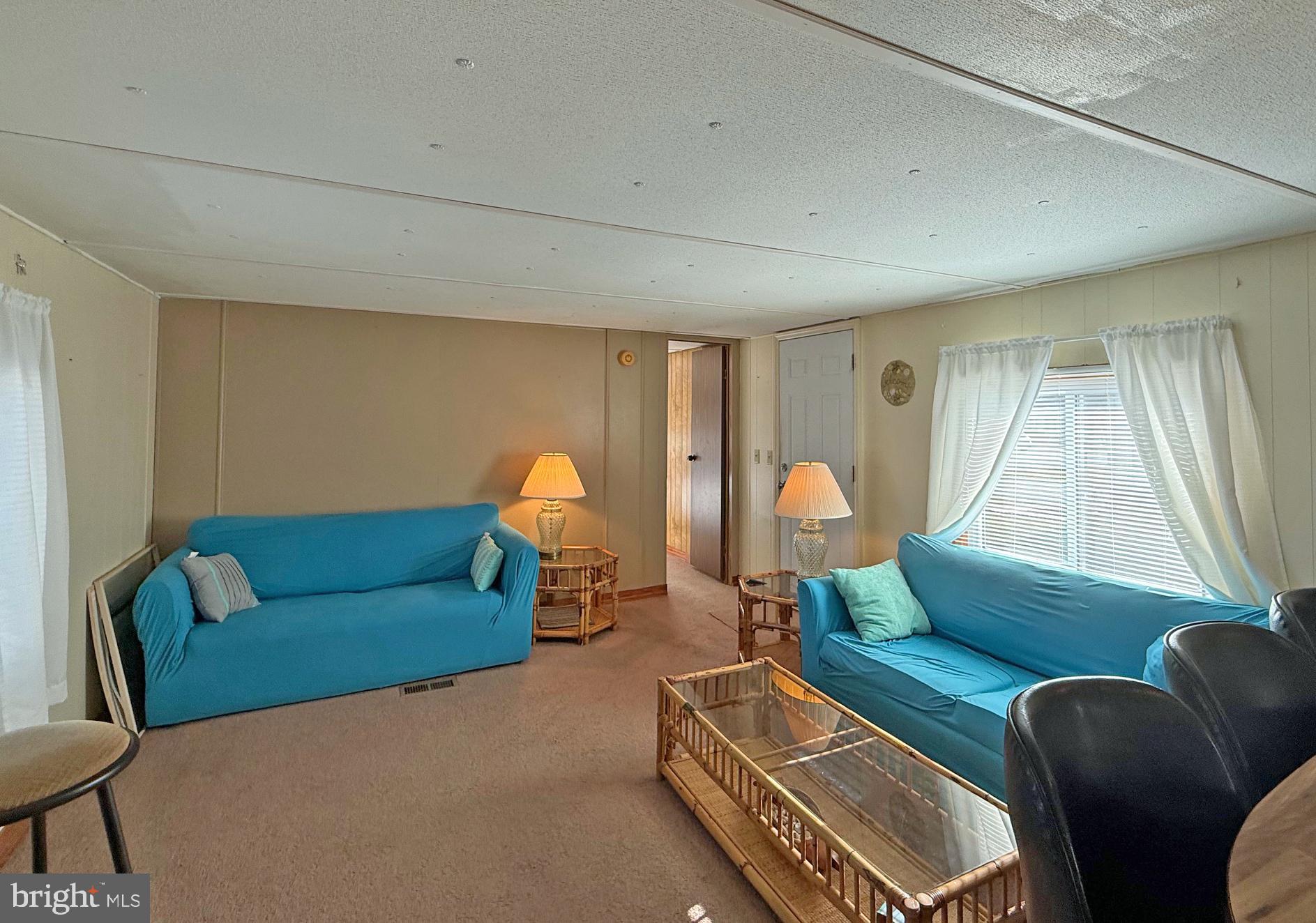 29 Baybreeze Road, Unit C27 Rehoboth Beach, DE 19971 - Photo 2 of 26 Living Room