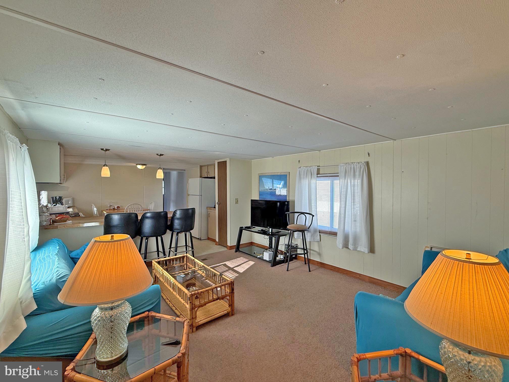 29 Baybreeze Road, Unit C27 Rehoboth Beach, DE 19971 - Photo 3 of 26 Living Room