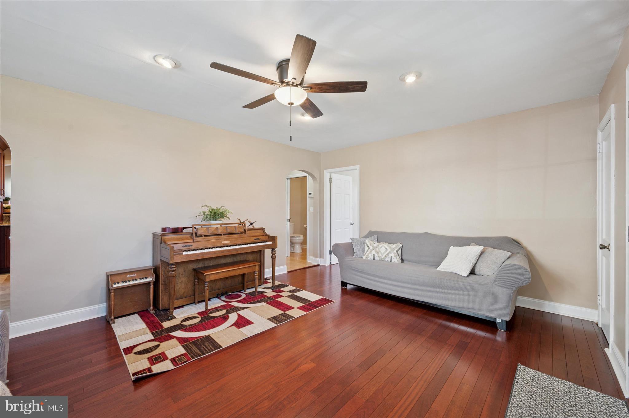 507 Bonsall Road Ridley Park, PA 19078 - Photo 7 of 35 a living room with furniture and a wooden floor