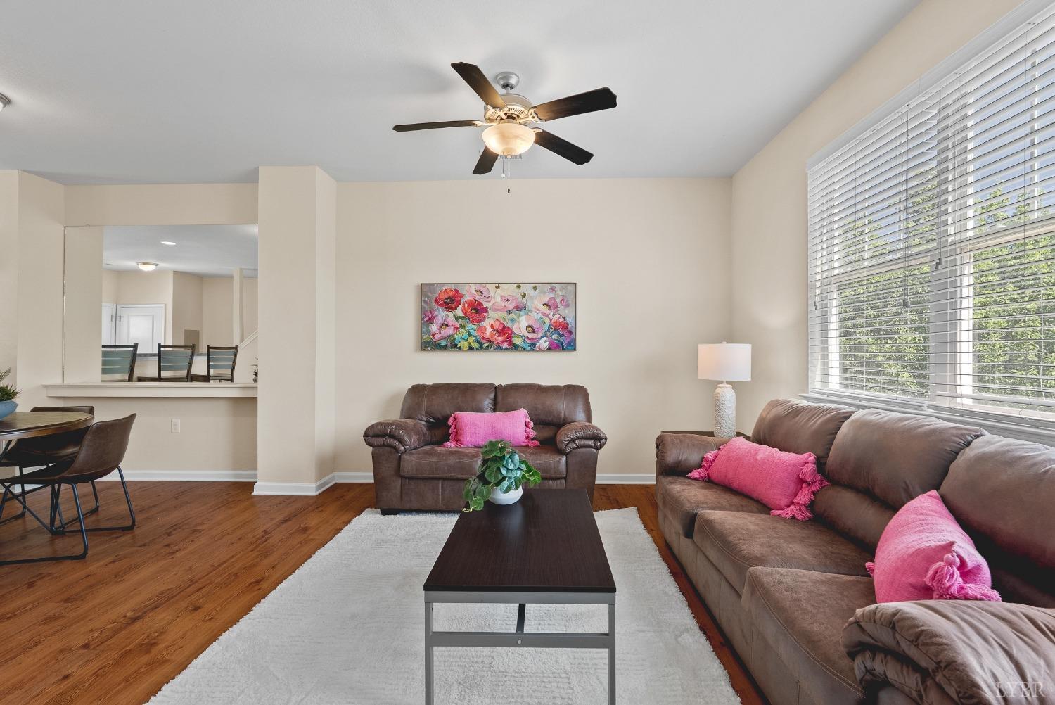1600 Wards Ferry Road, Unit 1001 Lynchburg, VA 24502 - Photo 11 of 48 a living room with furniture and a large window