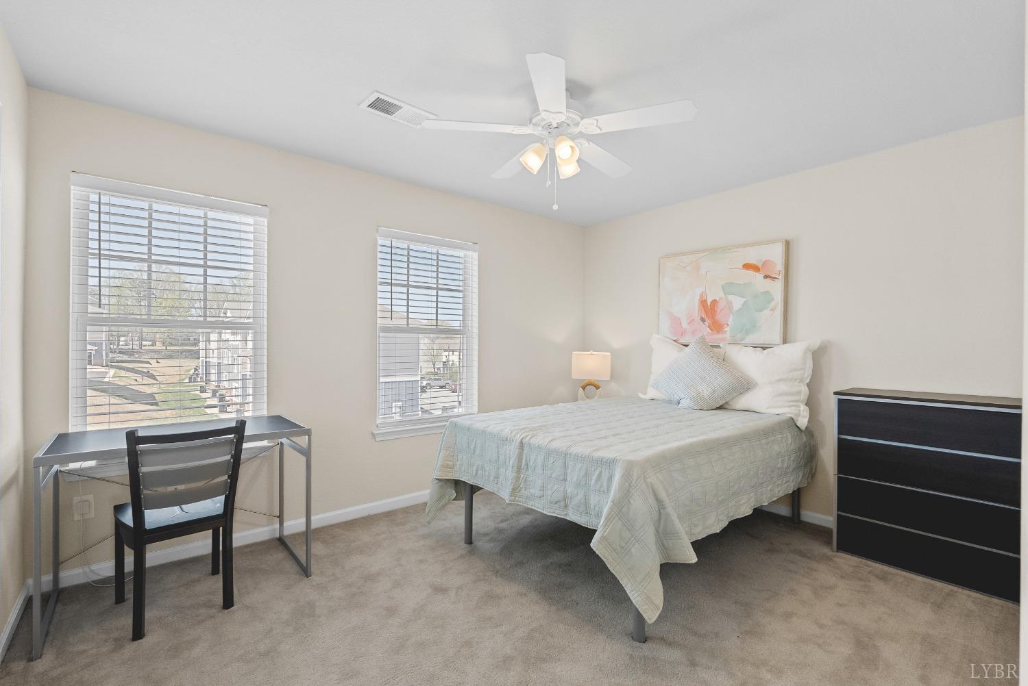 1600 Wards Ferry Road, Unit 1001 Lynchburg, VA 24502 - Photo 29 of 48 a bedroom with a bed and a window