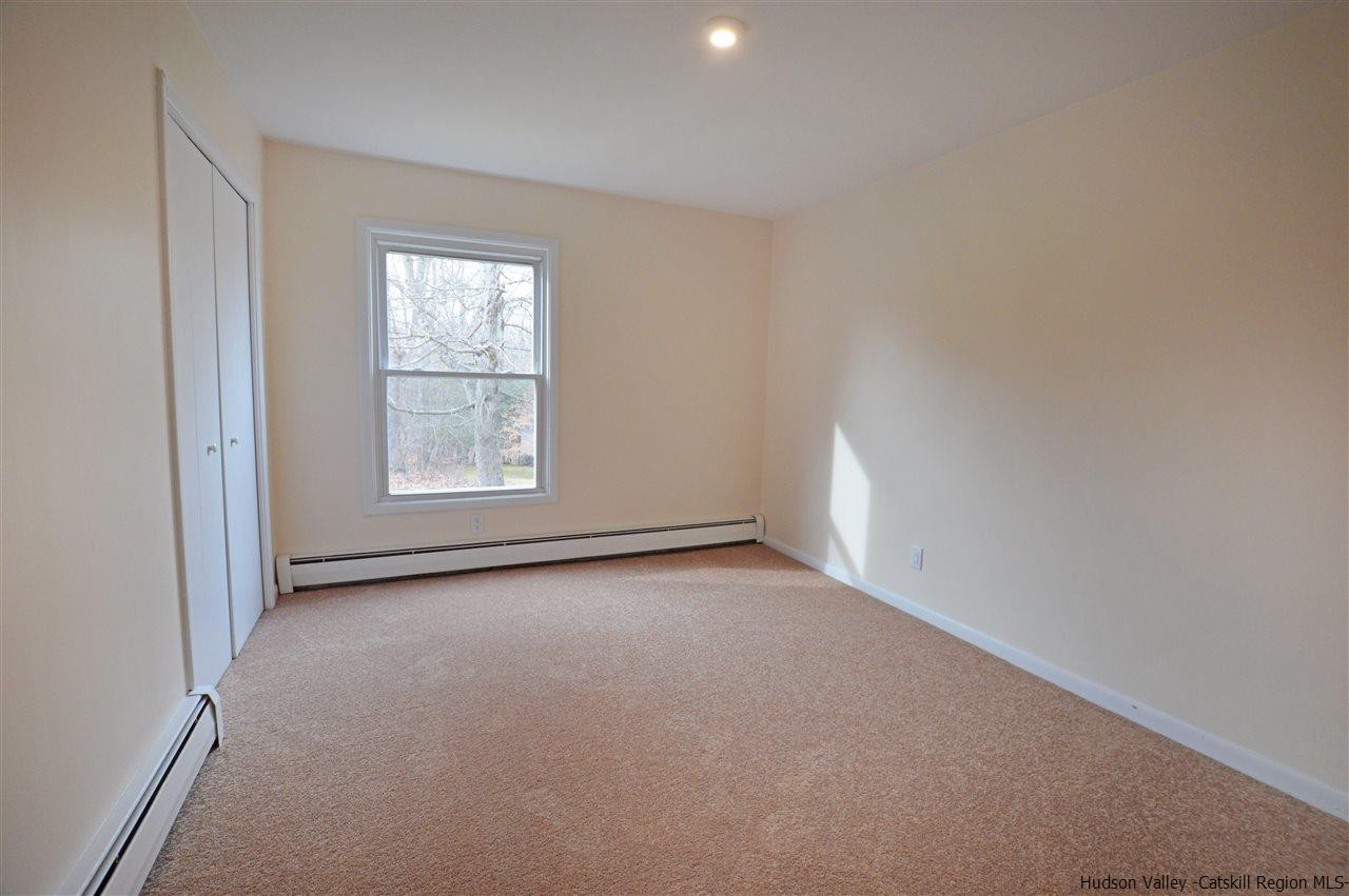 47 Roxanne Boulevard Highland, NY 12528 - Photo 14 of 24 an empty room with a window